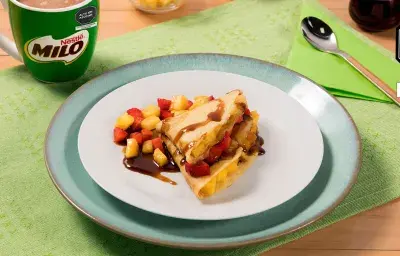 Crepes de Fruta y Miel de Chancaca Crepes de Fruta y Miel de Chancaca