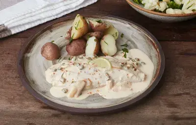 Pescado en salsa de alcaparras, ajo y lima Pescado en salsa de alcaparras, ajo y lima